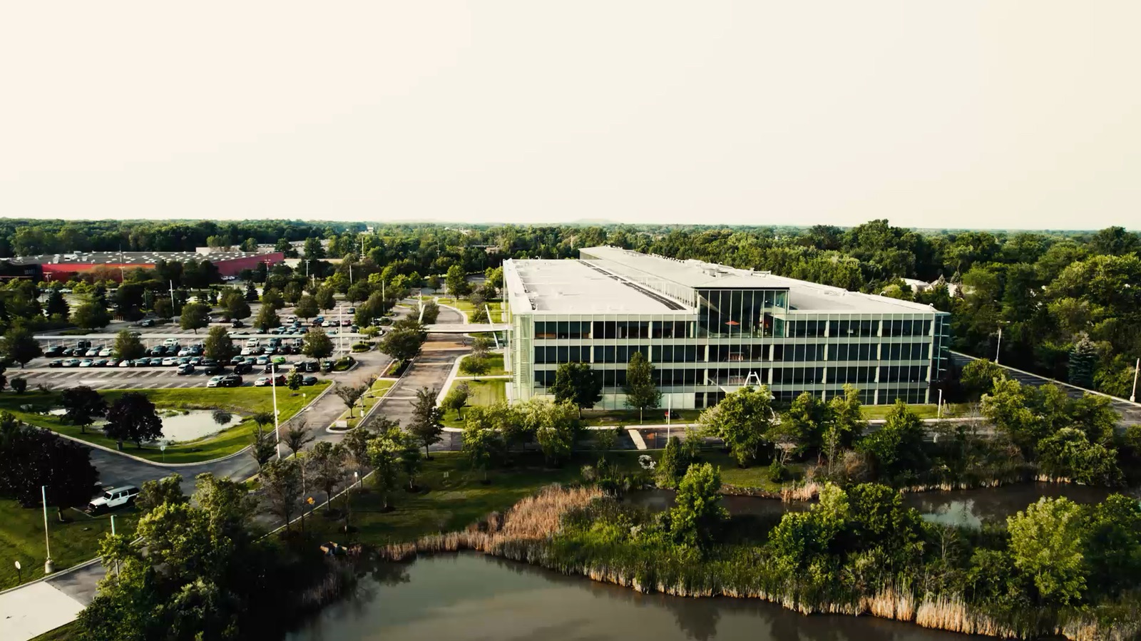 Aerial of the Yazaki campus by a pond