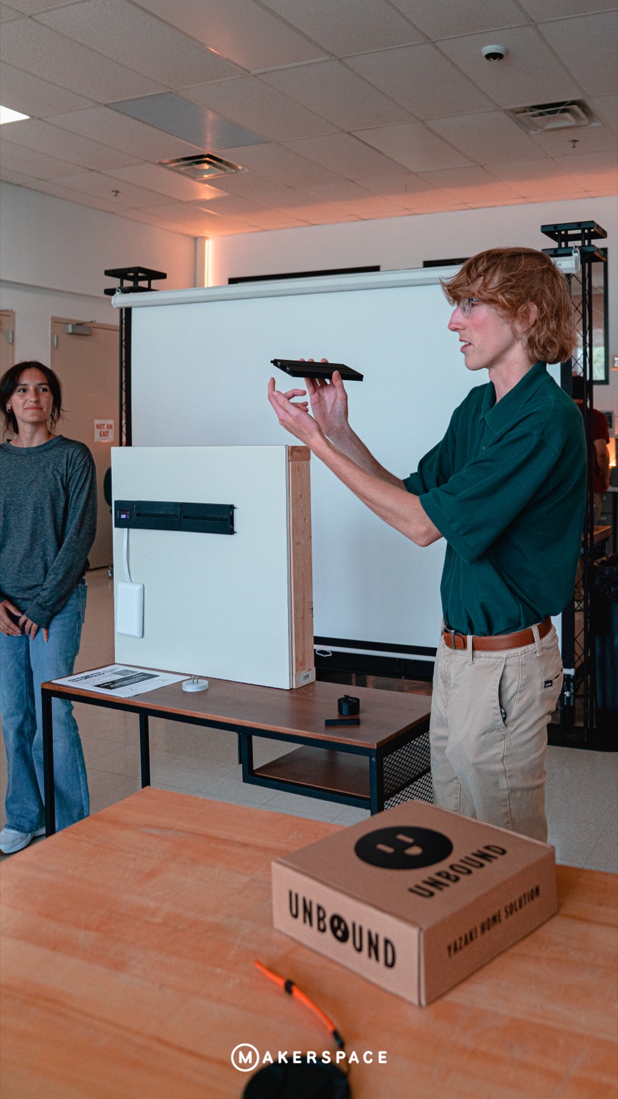 Maker presenting a project at Make and Tell