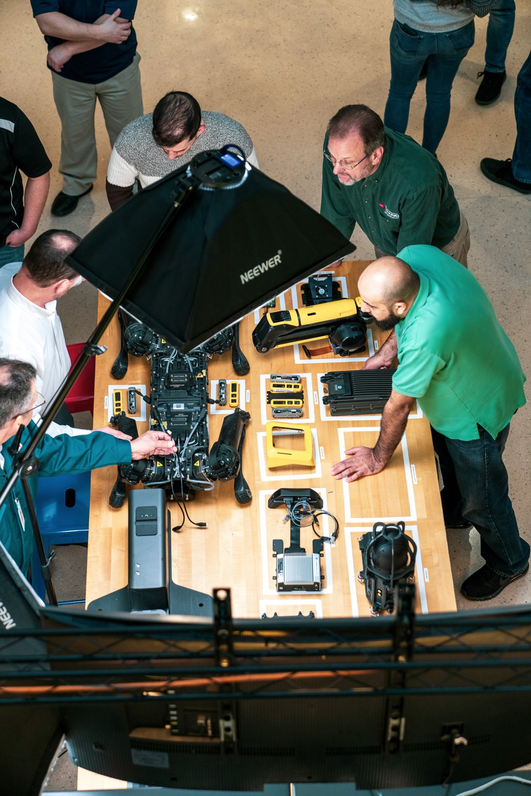 Overhead view of Spot robot parts laid out on a table